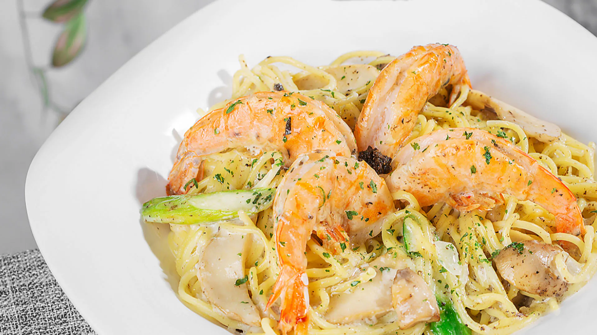 Creamy prawn spaghetti tossed in fragrant black truffle sauce at Smile House Cafe, a Hong Kong Style Fast Food Restaurant in San Francisco